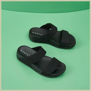 Close-up of lightweight black platform wedge sandals featuring dual straps and non-slip sole