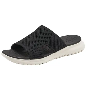 Sandali sportivi slip-on con tomaia in rete traspirante e suola spessa in MD in nero e bianco