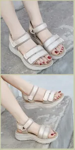 Detail view of beige platform sports sandals featuring velcro straps and mesh texture