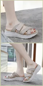 Detail of beige sporty platform sandals featuring criss-cross straps and velcro closure