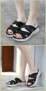 Detailed close-up showing thick platform soles and cross-mesh straps of summer sandals
