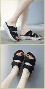Macro detail of breathable mesh straps and adjustable buckles on sporty platform sandals