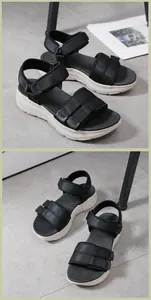 Detail view of black platform sports sandals with mesh fabric and adjustable velcro straps
