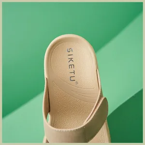 Detail of the thick-soled platform sandal showing non-slip textured footbed and SIKETU logo