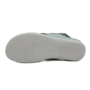 Women's chunky platform beach sandals in teal with non-slip gray wave texture soles
