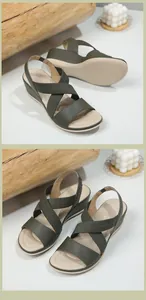 Detalle de sandalias de cuña verde oliva con correas cruzadas y acabado de cuero