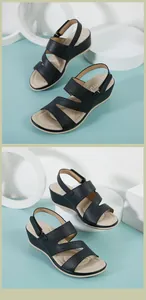 Detalle de sandalias de cuña negras con correas cruzadas texturizadas y tacón cómodo