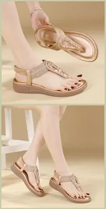Detail of bohemian flat sandals featuring sparkling rhinestones and elastic heel straps