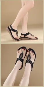 Dettaglio di sandali piatti boho con cinturini elastici intrecciati e decori dorati