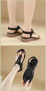 Detail of bohemian rhinestone sandals with black T-straps and comfortable wedge soles