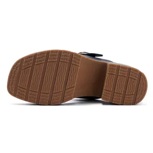 Close-up of anti-slip rubber sole with wave pattern and size mark on platform sandal