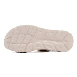 Detailed bottom view of thick platform sandals featuring anti-slip EVA foam grip pattern