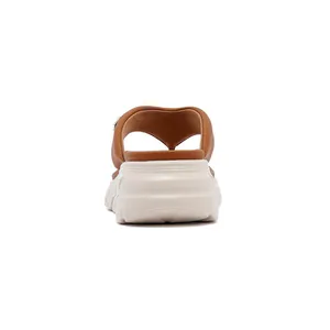 Rear view detail showing the thick anti-slip sole and brown straps of the casual sandal