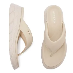 Beige platform flip-flops for women with thick soft soles and stylish faux leather straps