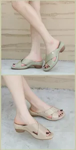 Close-up of women's wedge sandals with rhinestone-embellished straps in mint green and beige