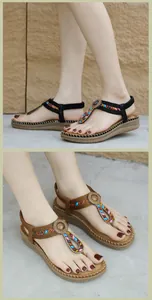 Detail of bohemian thong sandals with colorful beads and braided wedge sole