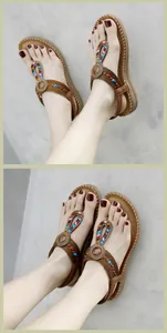 Detail of bohemian thong sandals with colorful beads, weaving, and latex massage sole
