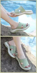 Macro detail of mint green wedge sandals featuring sparkling rhinestone H-shaped straps