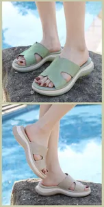 Close-up of women's wedge sandals with rhinestone H-shaped upper and platform sole