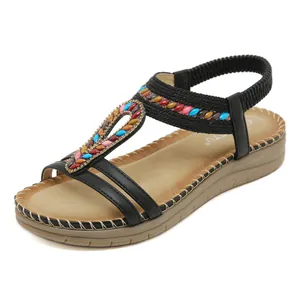 Bohemian wedge sandals with colorful beads and comfortable thick sole on white background