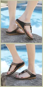 Close-up of bohemian flip-flops with woven rope and metal beads by the pool side