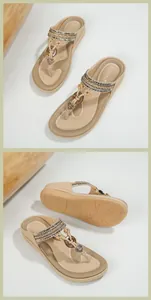 Detailed view of beige flip flops with rhinestones, floral decor and textured anti-slip sole