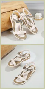 Detailed view of beige Bohemian flat sandals with T-strap rhinestones and elastic heel strap