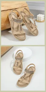Detailed macro view of beige T-strap sandals with sparkling rhinestones and beaded patterns