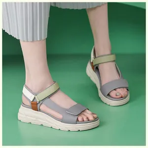Detail of women's thick sole platform sandals with adjustable velcro straps and casual design