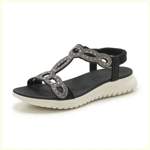 Detailansicht der Damen Sandalen in Schwarz mit Strasssteinen und weißer Sportsohle