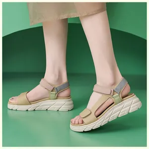 Detail of colorful platform sandals with multi-color straps and anti-slip sole on model