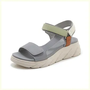 Detail view of platform sport sandal with tri-color velcro straps and anti-slip thick sole