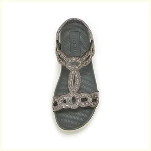 Detailansicht der dunkelgrauen flachen Sandalen mit glitzernden Strass-T-Riemen und Gummizug