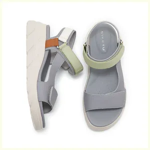 Macro view of multi-color platform sports sandals with adjustable velcro straps