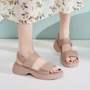Women's beige chunky platform sandals with dual adjustable velcro straps for summer