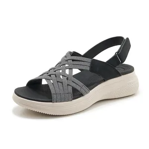 Damen Plateausandalen mit schwarzen gewebten Riemen und leichter MD-Keilsohle