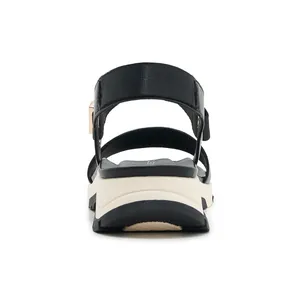 Rear view of sporty platform sandals with black woven straps and chunky color-block sole