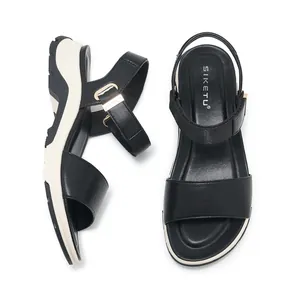 Women's platform wedge sandals with black contrast straps and comfortable thick soles