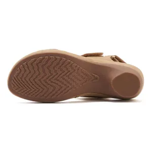 Detail view of anti-slip rubber outsole with size 36 mark for rhinestone wedge sandals