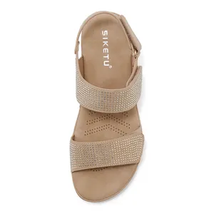 Detail of wedge sandal with rhinestone straps and a SIKETU non-slip cushioned footbed