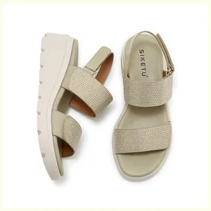 Top view of olive green platform sandals with rhinestone straps and velcro closure
