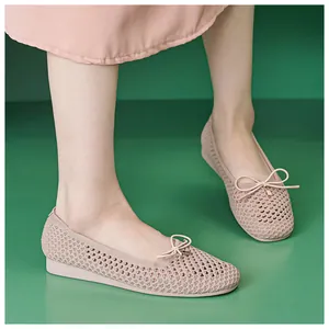 Detailed knit pattern on pink bow flat shoes with breathable openwork and metal accent