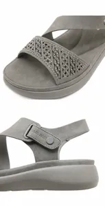 Detail van grijze platformsandalen met strass-textuur en zacht ademend bovenwerk