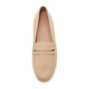 Top view of beige leather penny loafer with cushioned tan insole and sleek minimal design