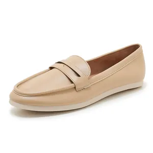 Women's apricot penny loafers with soft leather upper and white flat rubber sole