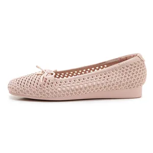 Detail of light pink mesh ballet flats featuring breathable hollow weave and bow accent