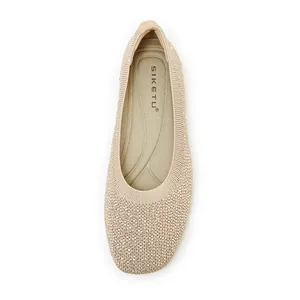 Top-down view of knit ballet flats with silver rhinestones and arch support insole