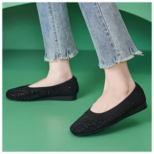 Women's black knitted ballet flats with rhinestones and comfortable low heel design