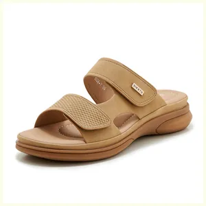 Macro detail of khaki wedge sandal featuring woven texture straps and ergonomic footbed