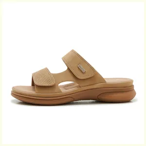 Detailed side view of beige wedge sandals featuring braided straps and soft suede texture